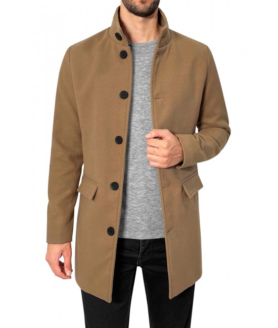 A person wearing a coat

Description automatically generated